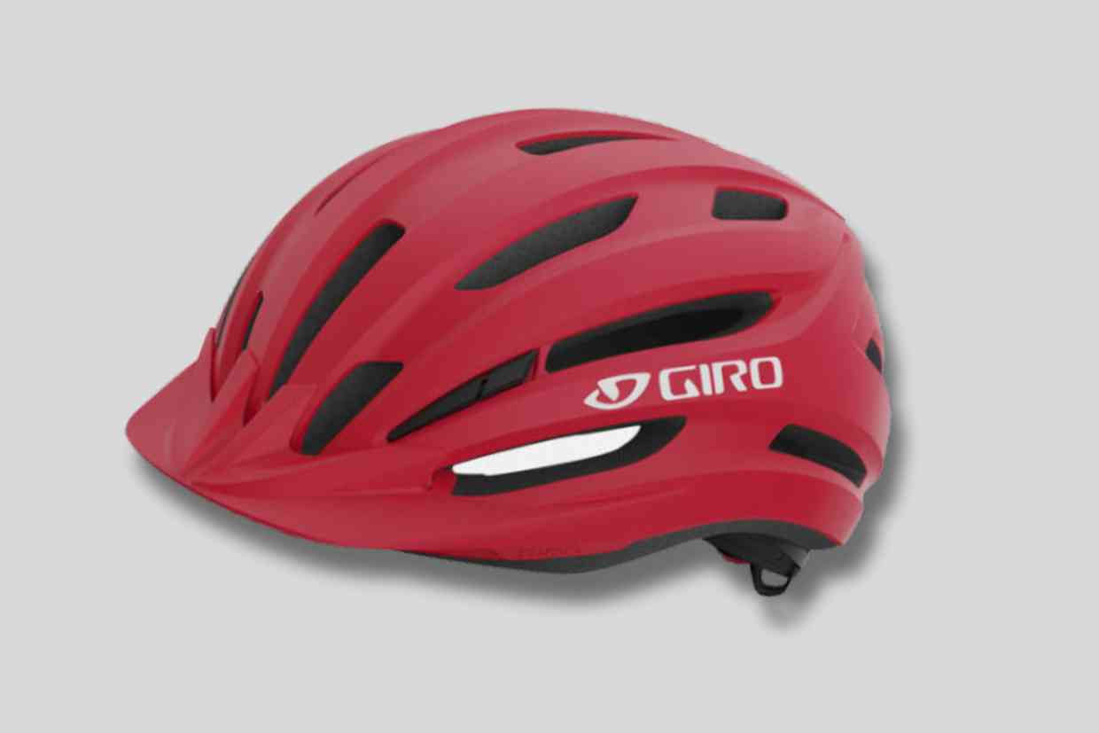 Capacetes_300-Corpo-6 Capacete vermelho da marca Giro com design aerodinâmico e estrutura leve para mountain bike.