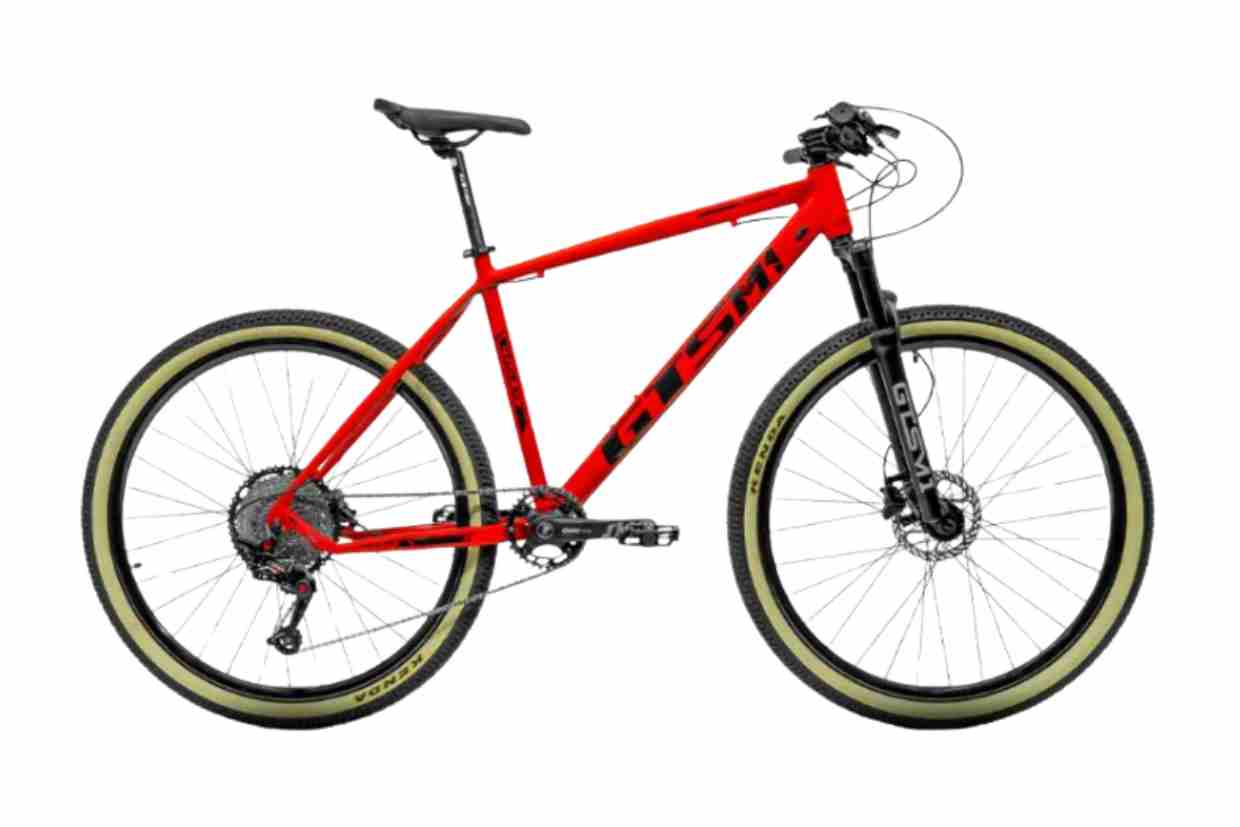 Imagem de uma das diversa marcas de bicicletas mountain bike, como a GTS M1 vermelha com suspensão dianteira e pneus de alto desempenho.